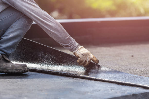 Professional Basement Waterproofing technician working in Pitman, NJ